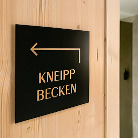 Signage for the Lifestyle Hotel Alpina in Klosters, Switzerland